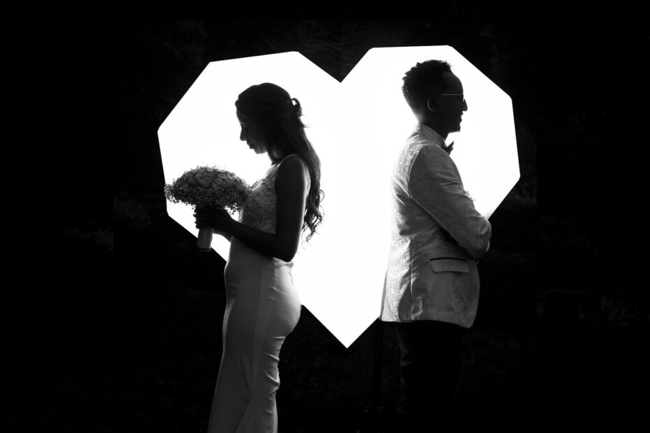 a man and woman holding hands